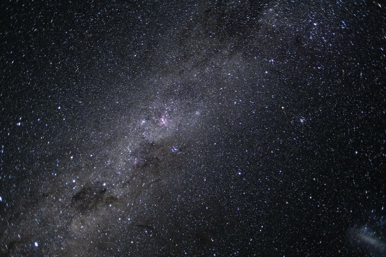 Milky Way galaxy swirling amidst starry background